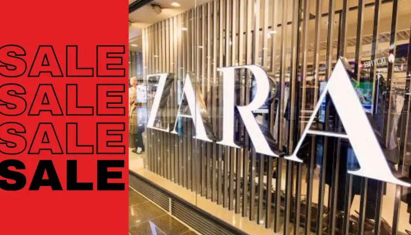 Kiedy promocje w Zarze! Duże napisy "SALE" na czerwonym tle obok witryny sklepu z logo ZARA.